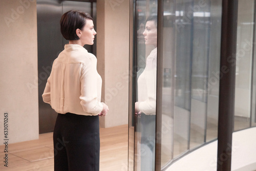 Woman by window at Blavatnik School of Government photo