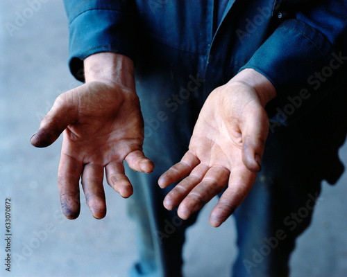 Man's dirty hands photo