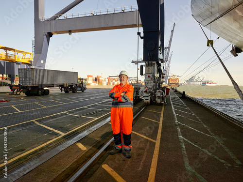 Docks supervisor taking controll of loading process at port docks photo