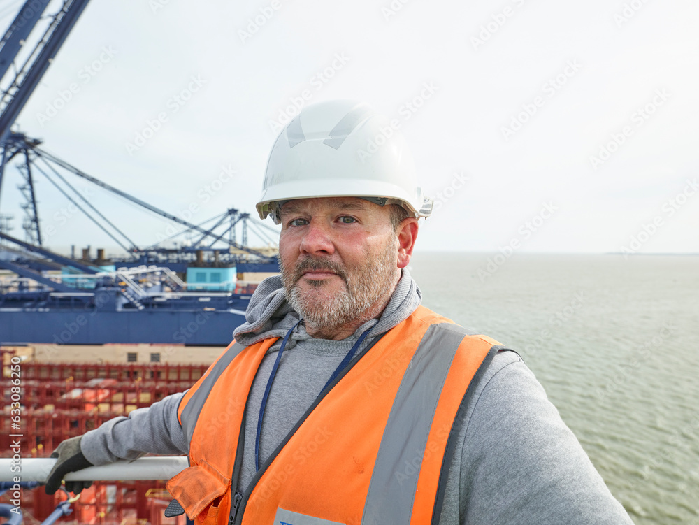 Dock worker with hard hat Dock worker with hard hat