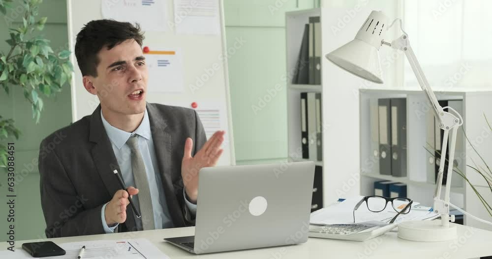 Energetic entrepreneur is shown singing and dancing at his work desk. With high spirits and infectious enthusiasm, he turns his workspace into a joyful dance floor. Energetic entrepreneur is shown singing and dancing at his work desk. With high spirits and infectious enthusiasm, he turns his workspace into a joyful dance floor.