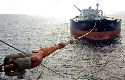 Oil tanker moored to oil rig