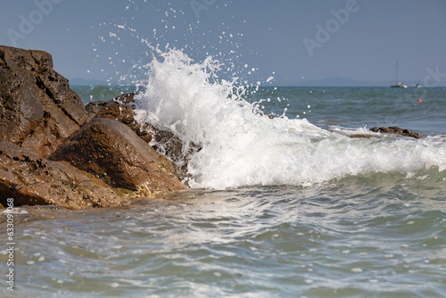 Sea waves crashing on rocks/reefs
