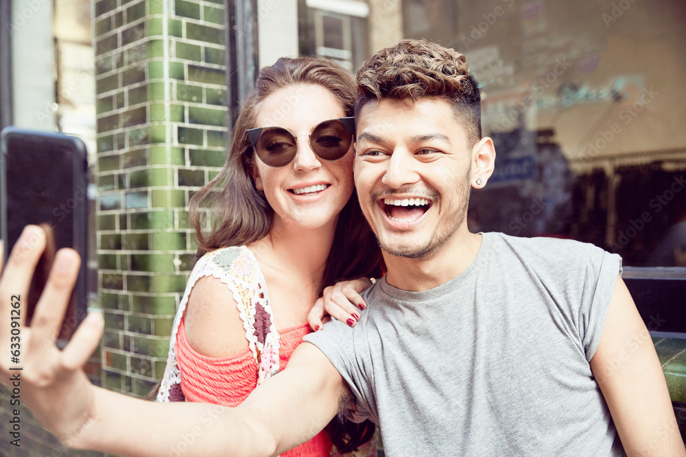Teenage couple taking selfie together Teenage couple taking selfie together