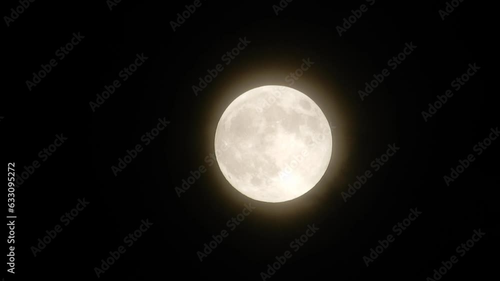 Moon Slowly Rising With Clouds In Front Bright Moonlight In Night Sky Moon Slowly Rising With Clouds In Front Bright Moonlight In Night Sky