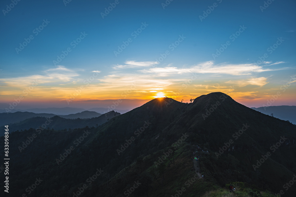 Beautiful Sunset view and layers mountains on khao khao chang phueak mountian.Thong Pha Phum National Park's highest mountain is known as Khao Chang Phueak