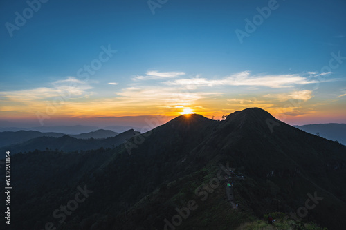 Beautiful Sunset view and layers mountains on khao khao chang phueak mountian.Thong Pha Phum National Park's highest mountain is known as Khao Chang Phueak