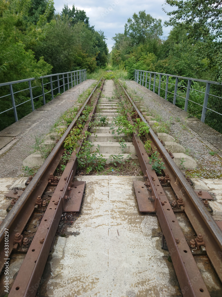Rails going into the grass