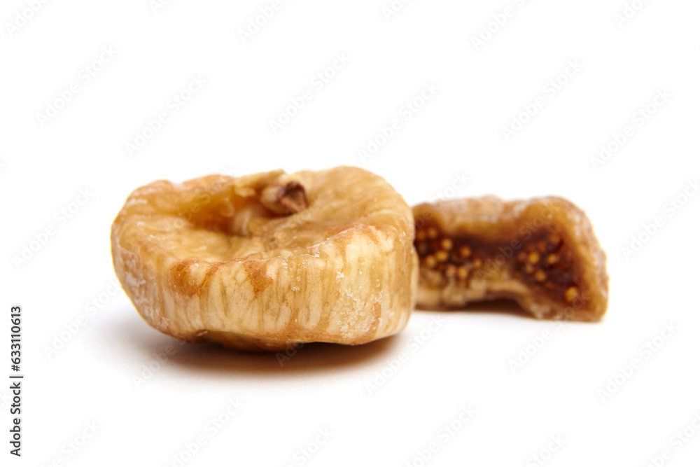 Dried figs isolated on white background. Healthy snacks dried fruit. Whole and halved fig with seeds Dried figs isolated on white background. Healthy snacks dried fruit. Whole and halved fig with seeds