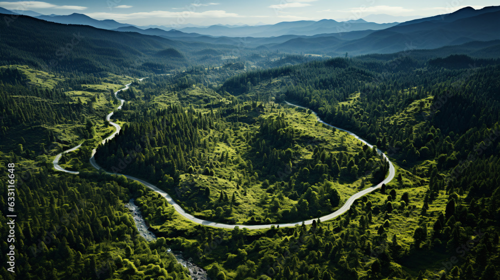 Aerial view of a road in the middle of the green forest , road curve up to mountain. Travel with car concept. Aerial view of a road in the middle of the green forest , road curve up to mountain. Travel with car concept.
