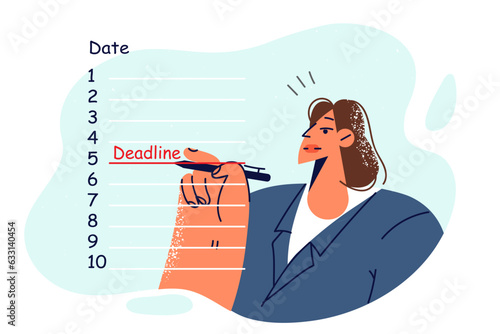 Woman fills in calendar of business deadlines and prepares to fulfill tasks of startup manager