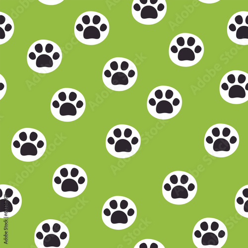 Seamless pet paw pattern. Cat or dog footprint on green background. Vector illustration. It can be used for wallpapers  wrapping  cards  patterns for clothes and other.