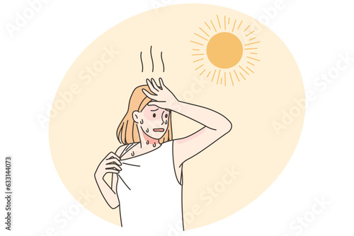 Overheated woman suffer from hot weather