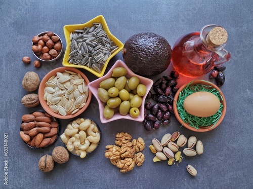 Food high in linoleic acid. Natural food sources of omega 6 and omega 3 essential fatty acids. Healthy fats - nuts, seeds, oils, vegetable; concept of healthy and balanced diet. photo