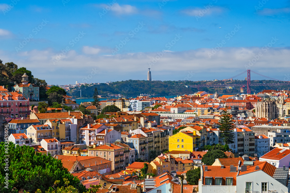 View of Lisbon from Miradouro dos Barros viewpoint with clouds. Lisbon, Portugal