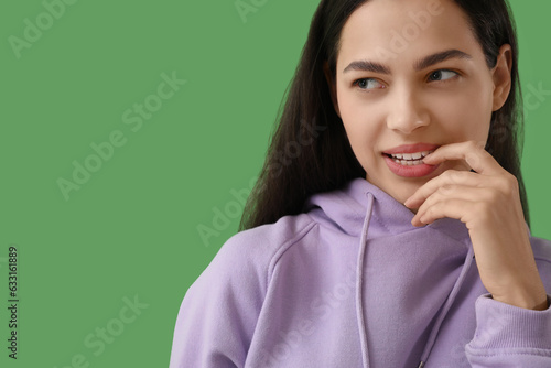 Beautiful young woman on gr...