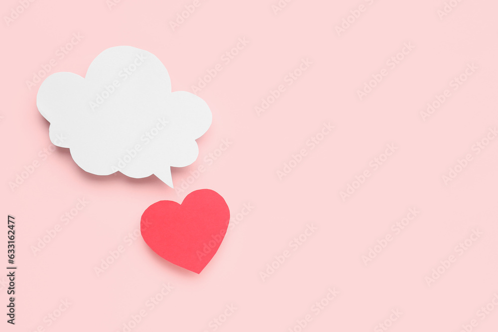 Paper heart with blank speech bubble on pink background