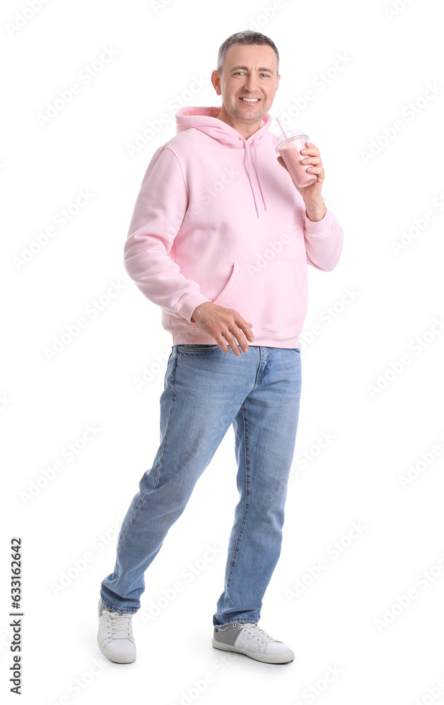 Mature man with glass of fruit smoothie on white background Mature man with glass of fruit smoothie on white background