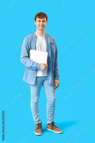 Male programmer with laptop...