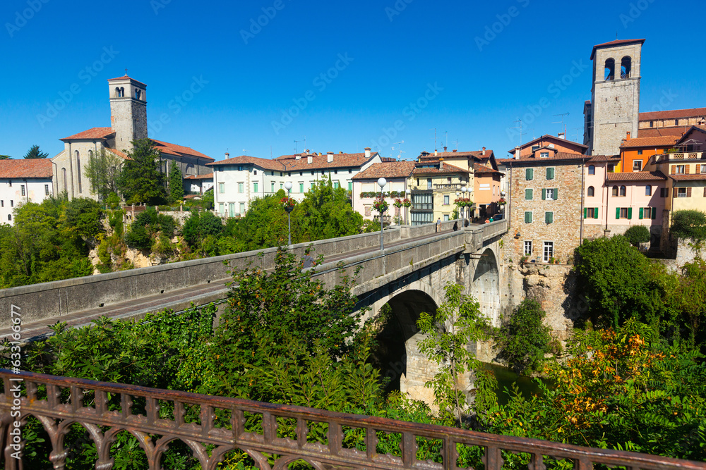 Devils bridge with cathedral at the background. Cividale del Friuli. Italy