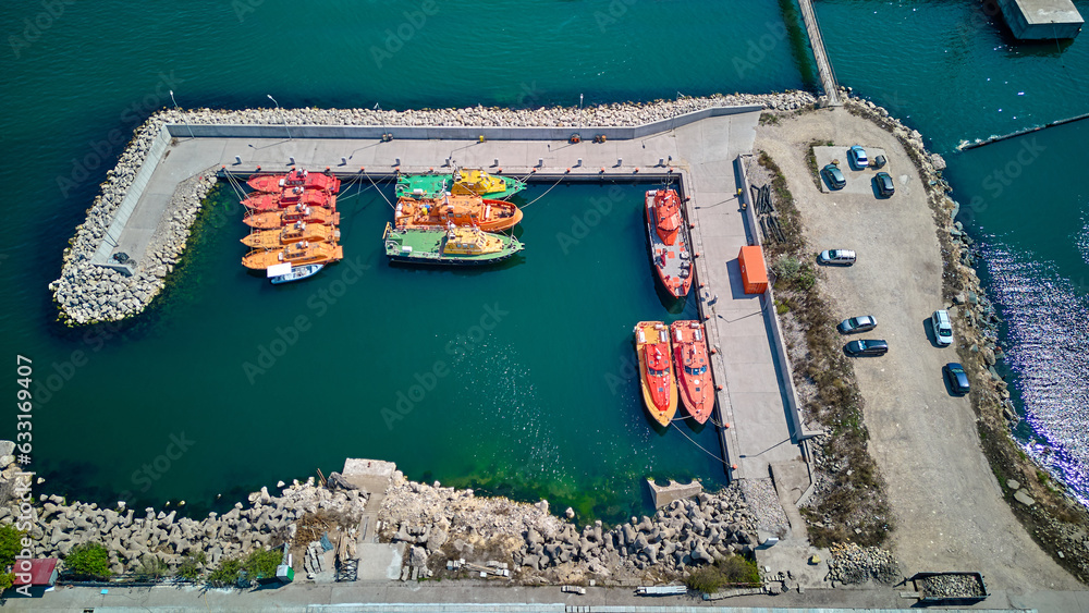 Maritime lifeboat and rescue boat in port. Aerial view