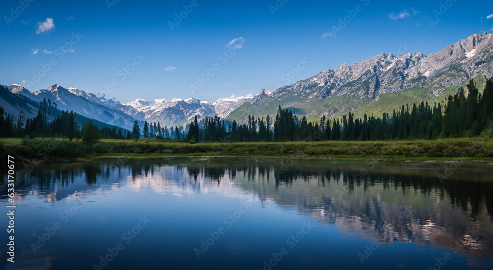 majestic fairytale landscape with a large lake and mountains in the background