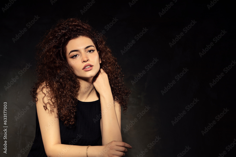 Fototapeta premium Portrait photos of a young, beautiful, white-skinned and red-haired girl, headshot. Portrait, headshot photos of a young and talented actress candidate, taken on a black background