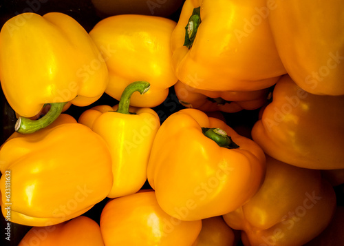 yellow bell peppers filling the frame photo