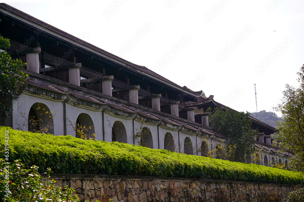 Chinese dynasty inspired traditional building with arch windows                               