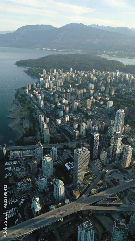 Vertical video. Aerial view of the skyscrapers in Downtown of Vancouver, Canada Vertical video. Aerial view of the skyscrapers in Downtown of Vancouver, Canada