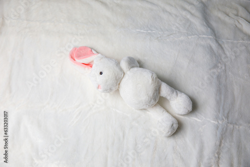 White plush toy rabbit on White background © kowitstockphoto
