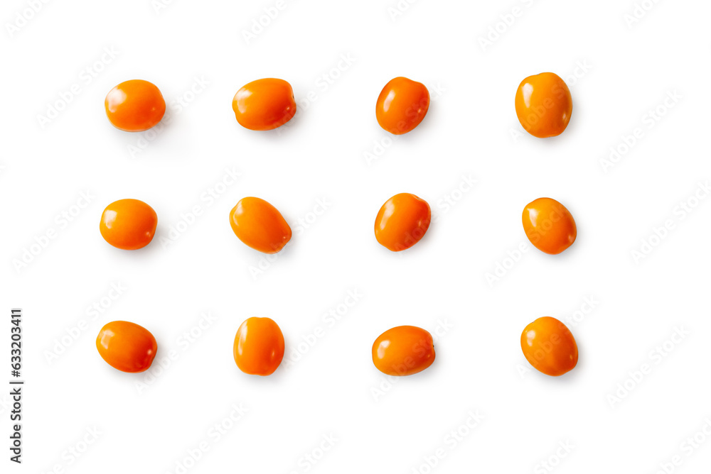Closeup of fresh juicy organic orange cherry tomatoes from the garden on isolated white background from above