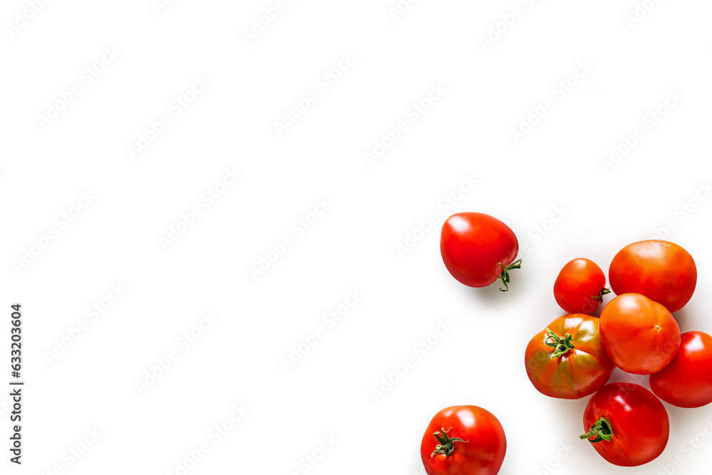 Closeup of fresh juicy organic tomatoes from the garden on isolated white background from above Closeup of fresh juicy organic tomatoes from the garden on isolated white background from above
