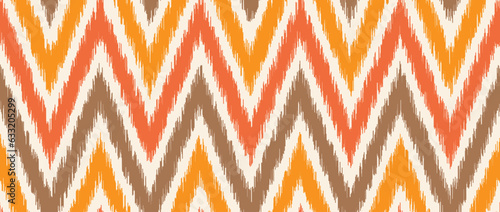 Seamless ikat pattern. Ethnic zigzag chevron repeating background. Ornamental tribal fabric and textile swatch print design. Vector asian folk abstract wallpaper