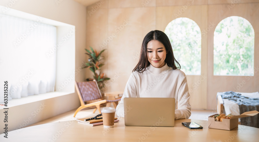 Portrait of sme business asian woman work from home at online computer desktop table hand hold coffee cup. Asia freelancer girl use laptop in bed room. Small business sme digital network, technology. Portrait of sme business asian woman work from home at online computer desktop table hand hold coffee cup. Asia freelancer girl use laptop in bed room. Small business sme digital network, technology.