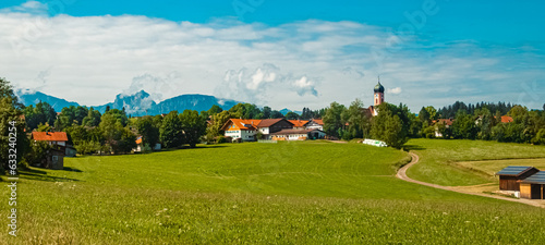 Alpine summer view with a church near Seeg, Ostallgaeu, Bavaria, Germany