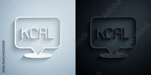 Paper cut Kcal icon isolated on isolated on grey and black background. Health food. Paper art style. Vector