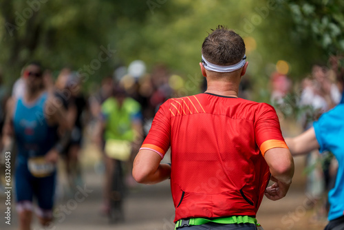 A triathlete during a race in summer temperatures 