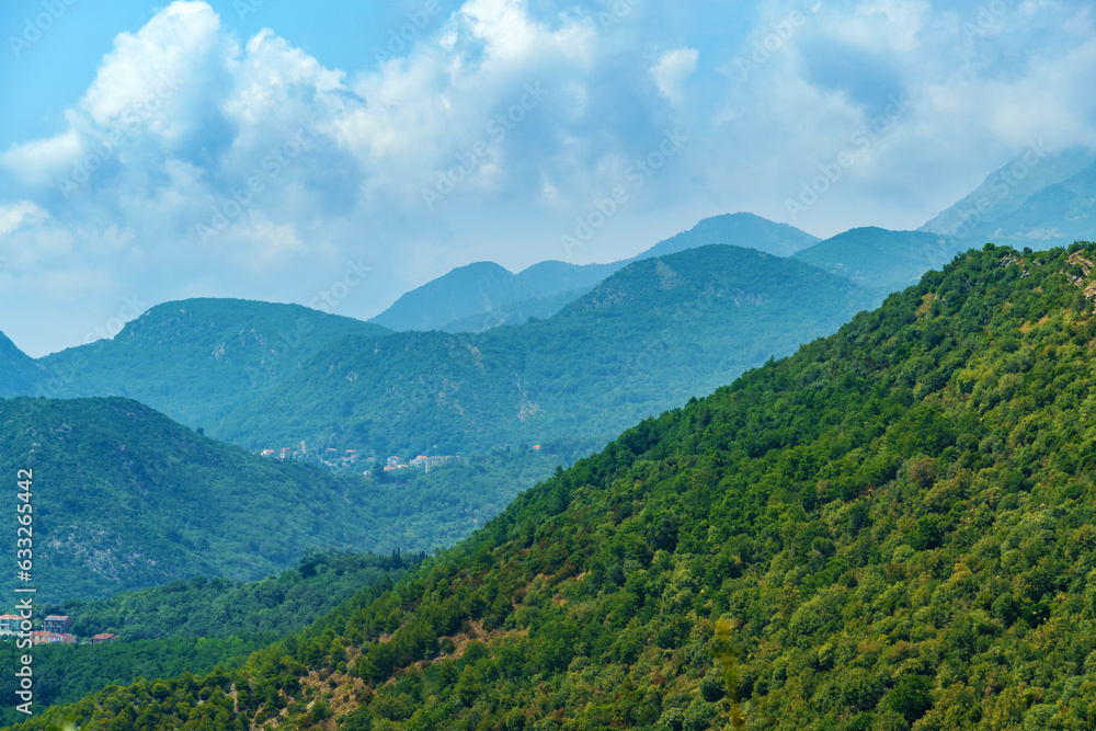 beautiful mountains, summer landscape, clouds, forest on the hillsides beautiful mountains, summer landscape, clouds, forest on the hillsides