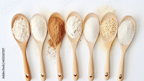 Wooden spoons of various gluten free flour (almond flour, amaranth seeds flour, buckwheat flour, rice flour, chick peas flour) from top view White background. Generative AI photo