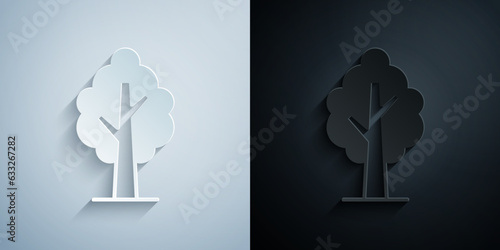 Paper cut Tree icon isolated on grey and black background. Forest symbol. Paper art style. Vector