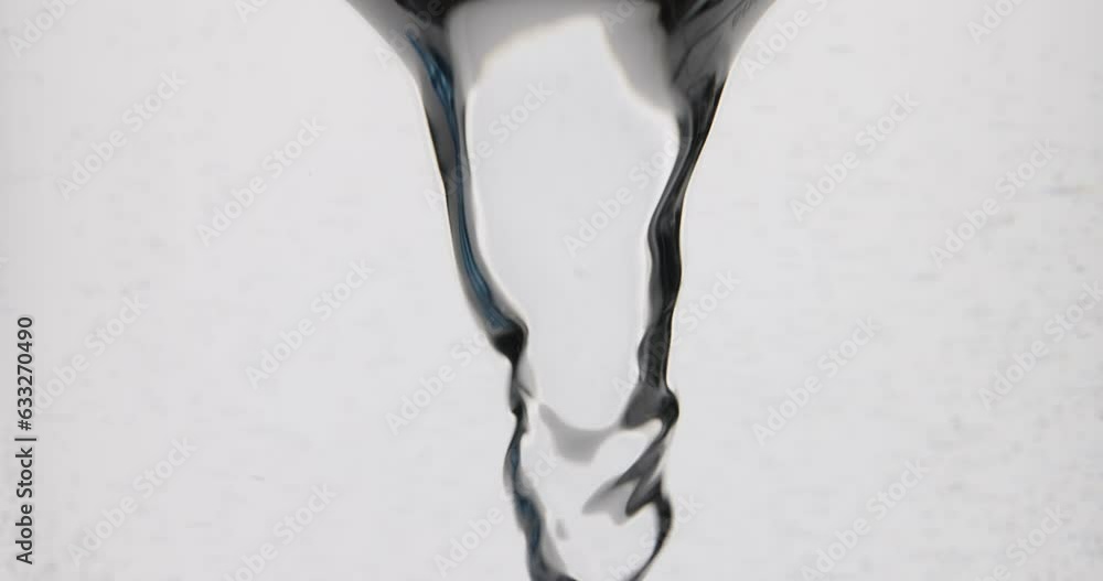 Flow of liquid water swirls into whirlpool or tornado. Fluid flow ...