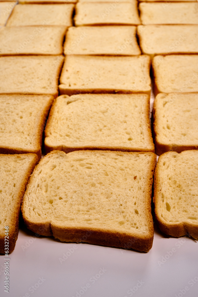 Slices of toast bread on a white background. Slices of toast bread on a white background.