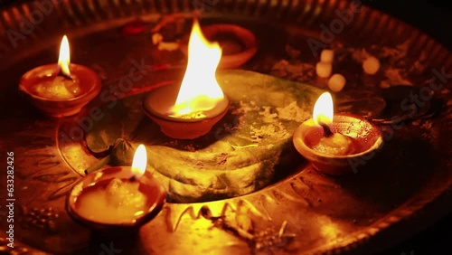 spiritual oil lamp called aarti in india on the occasion of holy ritual at home photo