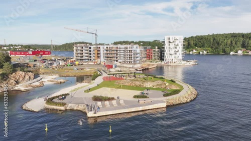 Aerial View Of Lokholmen Playground And Bathing Spot With Building Under Construction In The Background In Arendal, Norway. photo