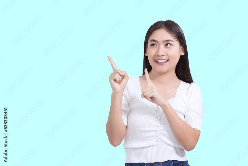 Young pretty Asian woman in black long hair wears white shirt and shows ...