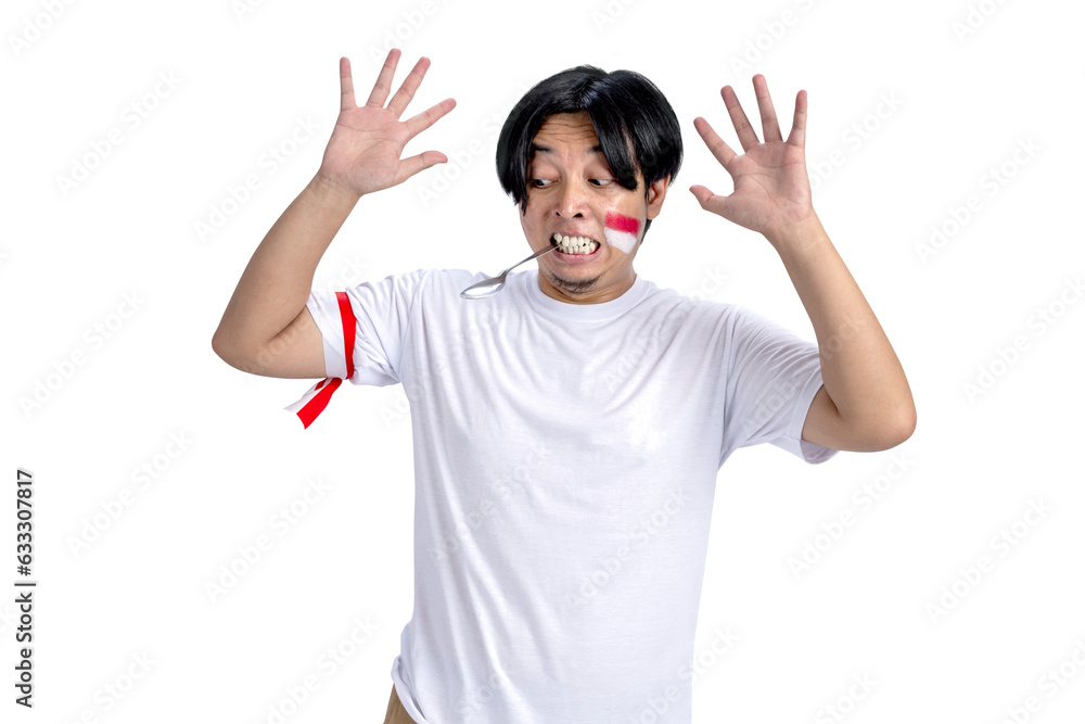 Indonesian men celebrate Indonesian independence day on 17 August with a marbles race using a spoon Indonesian men celebrate Indonesian independence day on 17 August with a marbles race using a spoon