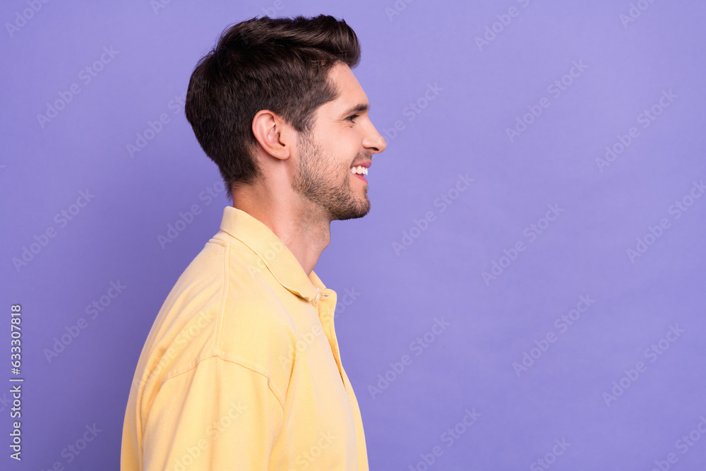 Profile photo of cheerful nice young person beaming smile look empty space ad isolated on violet color background Profile photo of cheerful nice young person beaming smile look empty space ad isolated on violet color background