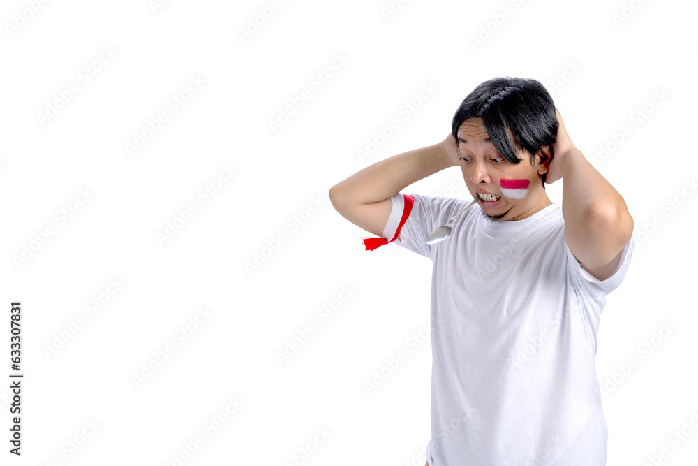 Indonesian men celebrate Indonesian independence day on 17 August with a marbles race using a spoon Indonesian men celebrate Indonesian independence day on 17 August with a marbles race using a spoon