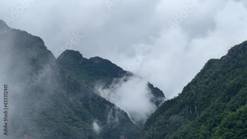 Wallpaper Mural Misty fog blowing over the mountain, rainy weather in mountains. Torontodigital.ca